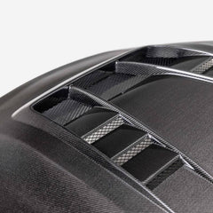 Seibon 23-25 Toyota Corolla GR TV-Style Double-Sided Carbon Fiber Hood | HD23TYGRCOR-TV-DS