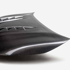 Seibon 23-25 Toyota Corolla GR TV-Style Double-Sided Carbon Fiber Hood | HD23TYGRCOR-TV-DS