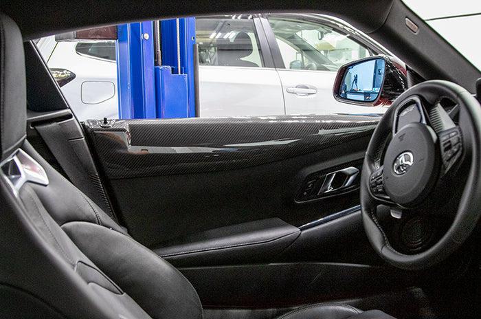 OLM LE Carbon Fiber Interior Door Trim Cover Set Toyota Supra 2020-2024 | A.70115.1