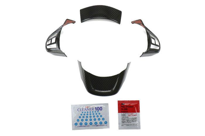OLM LE Carbon Fiber Steering Wheel Covers (4pc set) Toyota Supra 2020-2024 | A.70120.1