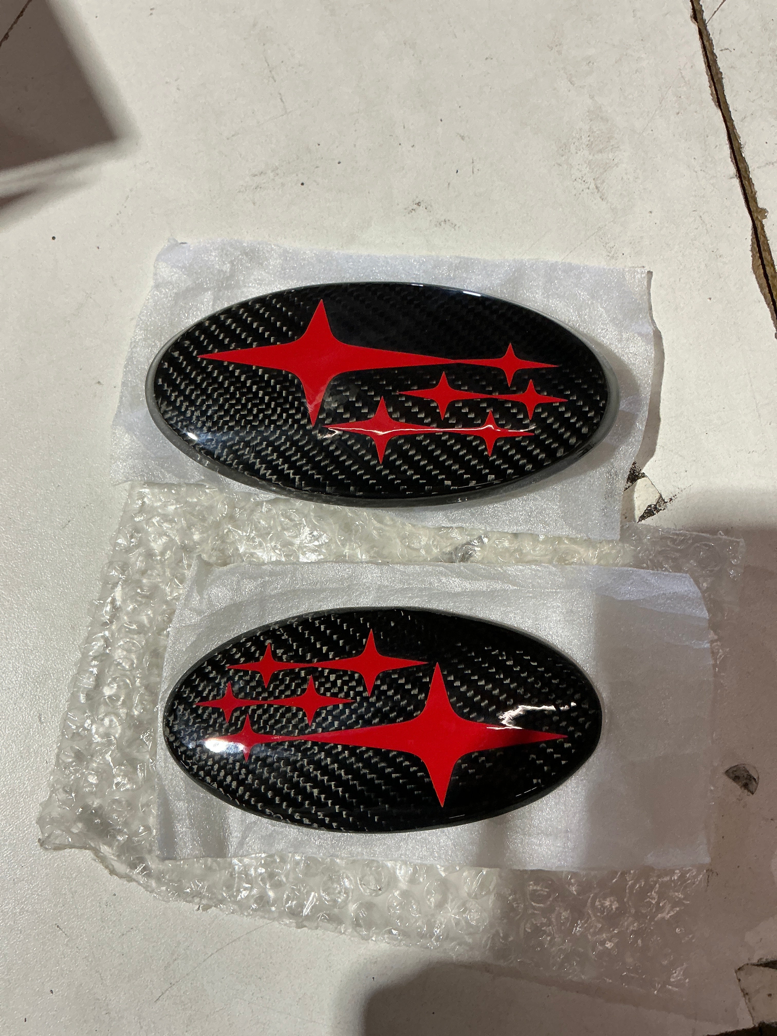 [OPEN BOX] Noble Frameless Front and Rear Emblems Carbon Fiber - 2022-2026 Subaru WRX - Neon Yellow - Red